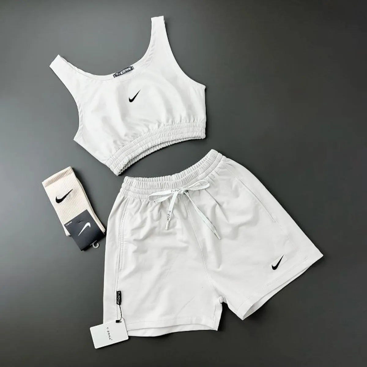 IMG_4707 ست نیمتنه و شورتک ورزشی نایک ، نیم تنه و شورتک ورزشی ، ست Nike , ست ورزشی زنانه ، ست باشگاهی زنانه نایک - تصویر 1